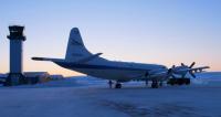 NASA's P-3B is pulled from the hangar onto the frozen runway at Thule, Greenland