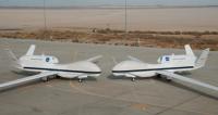  NASA's two Global Hawks line up nose-to-nose on the ramp at NASA's Dryden Flight Research Center