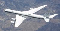 Numerous instrument probes protrude from NASA's DC-8 Airborne Science flying laboratory as it flies an instrument checkout flight. 