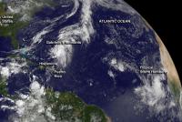 NOAA's GOES-East satellite captured a view of Tropical Storm Humberto (far right) and the remnants of tropical storm Gabrielle near the Bahamas on Sept. 9 at 7:45 a.m. EDT.