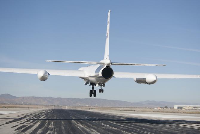 The ER-2, which is one of NASA's environmental research aircraft, lands following a mission. Image Credit:  NASA / Tom Tschida