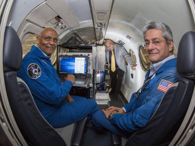 Langley researchers, from left, Mulugeta Petros, Upendra Singh and Tamer Refaat inside the King Air B200 aircraft on which they recently tested a new triple-pulse lidar that can simultaneously and independently measure carbon dioxide and water vapor, two powerful greenhouse gases. Credits: NASA/David C. Bowman