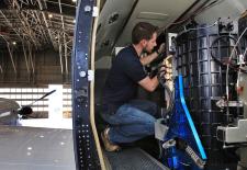 Technician Richard Hare installs instruments on NASA's UC-12 aircraft at NASA’s Langley Research Center in preparation for the airborne portion of the SABOR field campaign