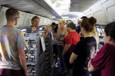 Don Blake, (second from left) professor of chemistry and Earth system science at the University of California - Irvine, briefs Student Airborne Research Program interns on the components of the Whole Air Sampler instrument. 