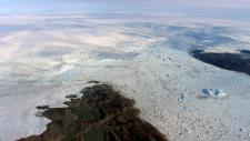 The calving front of Jakobshavn Glacier, center. Credits: NASA/OIB/John Sonntag