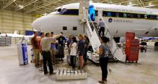 Professor Donald Blake of the University of California—Irvine outlines procedures for installation of air canisters on NASA's DC-8 flying laboratory to students participating in NASA's 2014 Student Airborne Research Program.