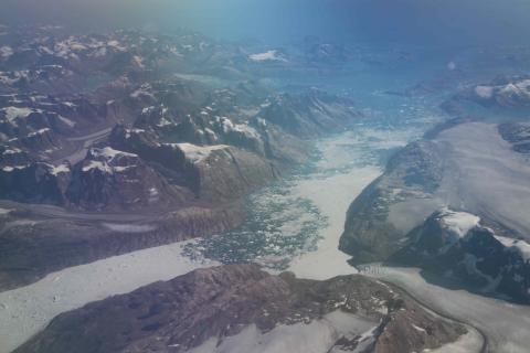 Coastal glaciers in SE Greenland, taken from 28,000' 