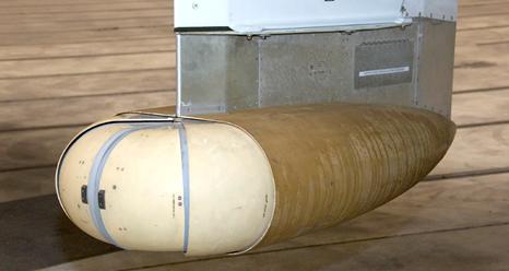 The Large Area Collector sensor is carried under the wing of a NASA ER-2