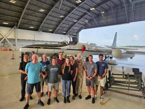 The joint team that worked on the Airborne Lightning Observatory for Fly’s Eye GLM Simulator (FEGS) and Terrestrial gamma-ray flashes (ALOFT) field campaign takes a break in front of NASA Armstrong’s ER-2 aircraft following its safe return from a mission on July 24. The ALOFT field campaign spent 30 days studying gamma-ray glows and flashes produced from the electric fields of thunderclouds. Credits: NASA