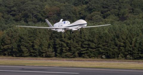 NASA's Global Hawk 871 lifts off from NASA's Wallops Flight Facility on its return trip to its home base at NASA's Dryden Flight Research Center on Sept. 25, 2013.