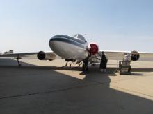 ER-2 mechanic loxing the plane