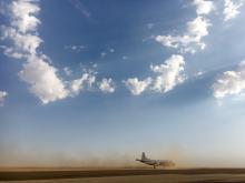 P-3 dusty arrival