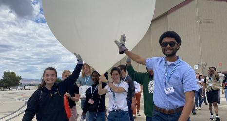 SARP students carry an ozone sonde balloon to launch at NASA’s Armstrong Flight Research Center in Palmdale, California.